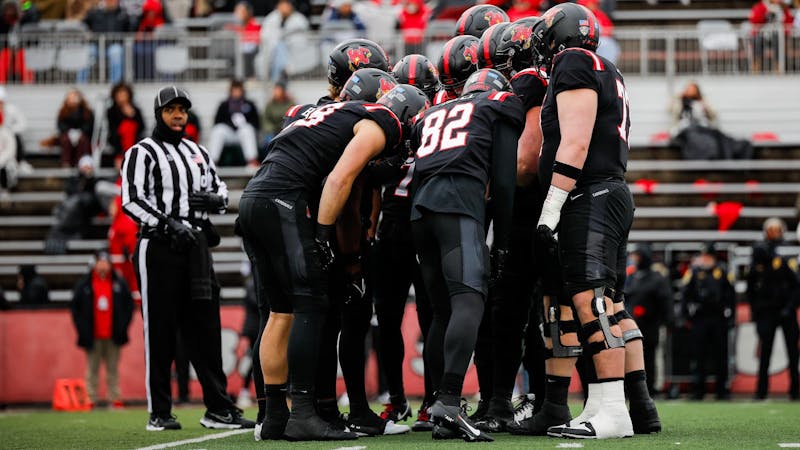 Ball State football huddles before a drive against Bowling Green Nov. 23 at Scheumann Stadium. Ball State was defeated 38-13. Andrew Berger, DN 