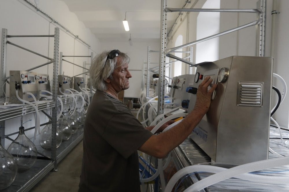 A worker checks a lung ventilator "Corovent" June 17, 2020, manufactured in Trebic, Czech Republic. A group of volunteers in the Czech Republic was working round the clock to prevent critical shortage of ventilators for COVID-19 patients. (AP Photo/Petr David Josek)