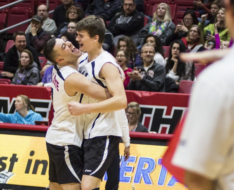 Setter, Connor Gross hugs outside attacker, Matt Szews after scoring one of the final set points to close the match against McKendree, Feb. 4 at Worthen Arena. Ball State defeated McKendree in three start sets, 25-16, 25-21, 25-16. Grace Hollars // Daily News