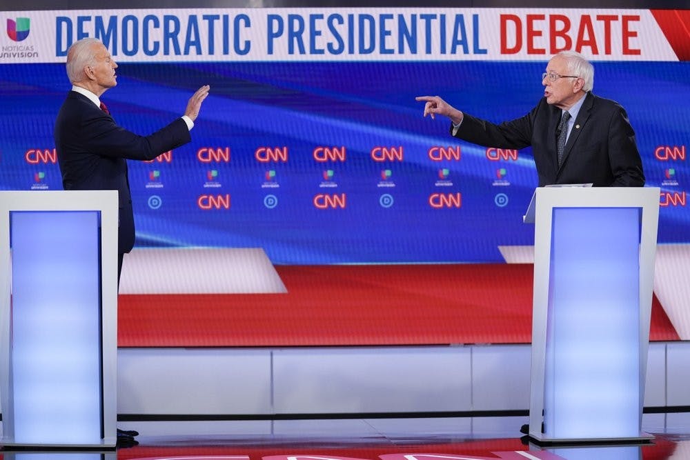 <p>Former Vice President Joe Biden, left, and Sen. Bernie Sanders, I-Vt., right, participate in a Democratic presidential primary debate at CNN Studios in Washington, Sunday, March 15, 2020. <strong>(AP Photo/Evan Vucci)</strong></p>