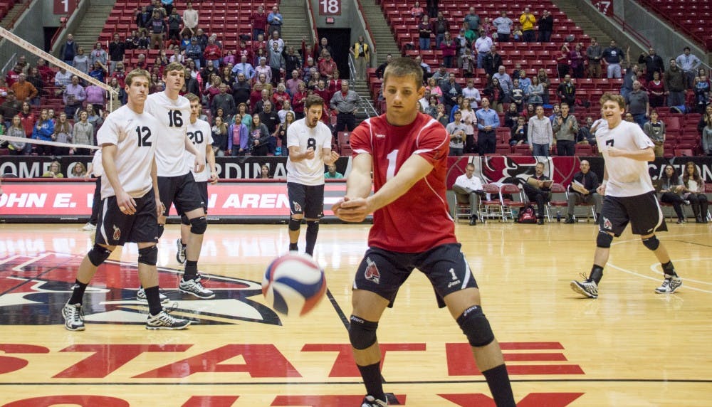 Senior libero David Ryan Vander Meer watches the ball go out of bounds at other members of the Ball State men's volleyball begin to celebrate winning the set point during the game against Grand Canyon on March 13 at Worthen Arena. DN PHOTO ALAINA JAYE HALSEY