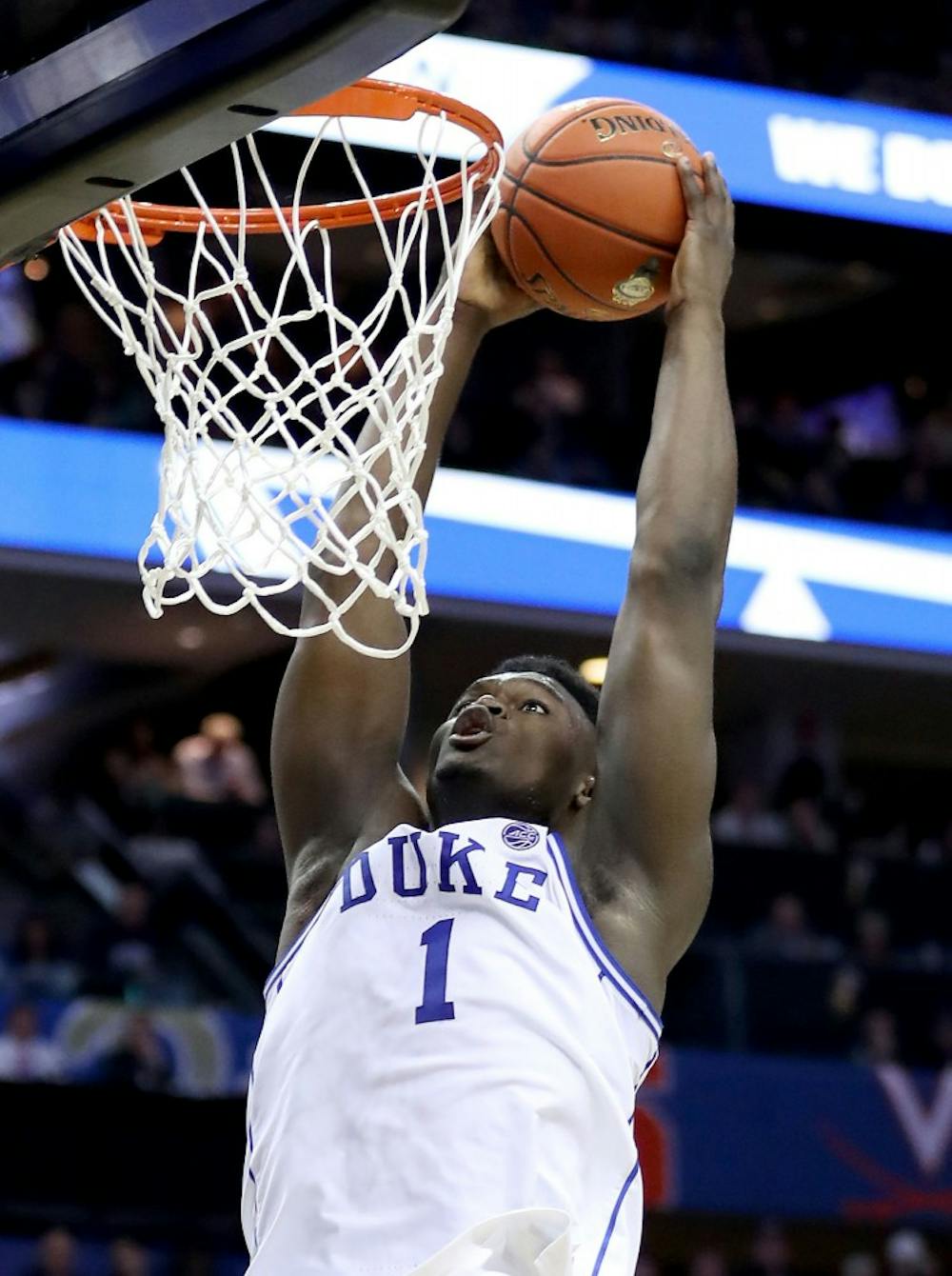 Duke's Zion Williamson dunks against he Florida State Seminoles during the championship game of the ACC Tournament at Spectrum Center in Charlotte, N.C., on Saturday, March 16, 2019. Duke won, 73-63. **FOR USE WITH THIS STORY ONLY** (Streeter Lecka/Getty Images/TNS)