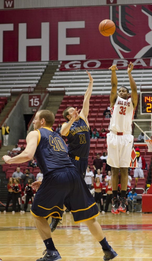 Jesse Berry, a senior guard, goes up to shoot a three against Marian University on Nov. 4 at Worthen Arena. Berry scored nine points. DN PHOTO BREANNA DAUGHERTY