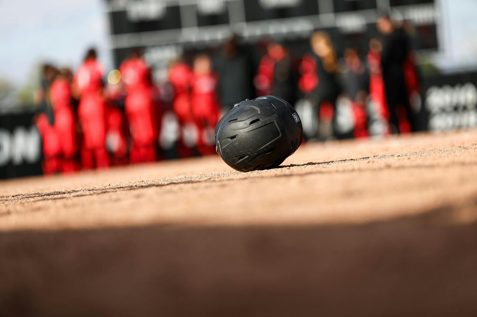 The Ball State softball team huddles after losing to Buffalo April 26 at Ball State Softball Stadium. Andrew Berger, DN 