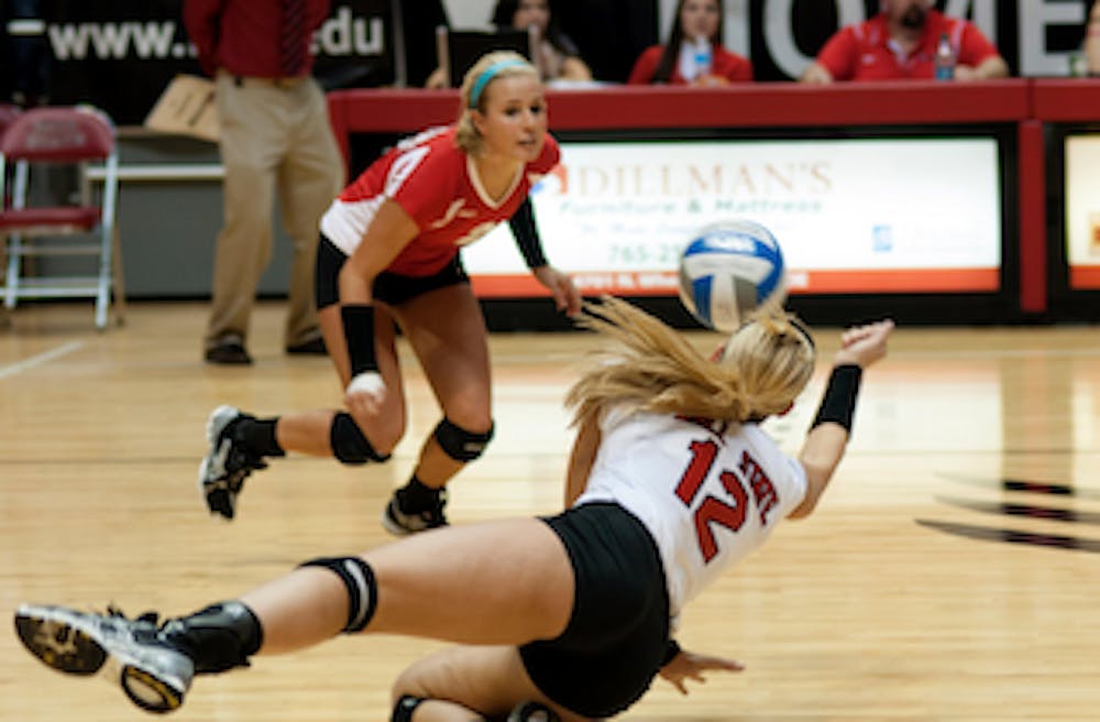 DN PHOTO RJ RICKER Jenna Spadafora dives to continue a long volley against her Ohio opponents. Ball State lost a tough game against Ohio 0-3 on Saturday