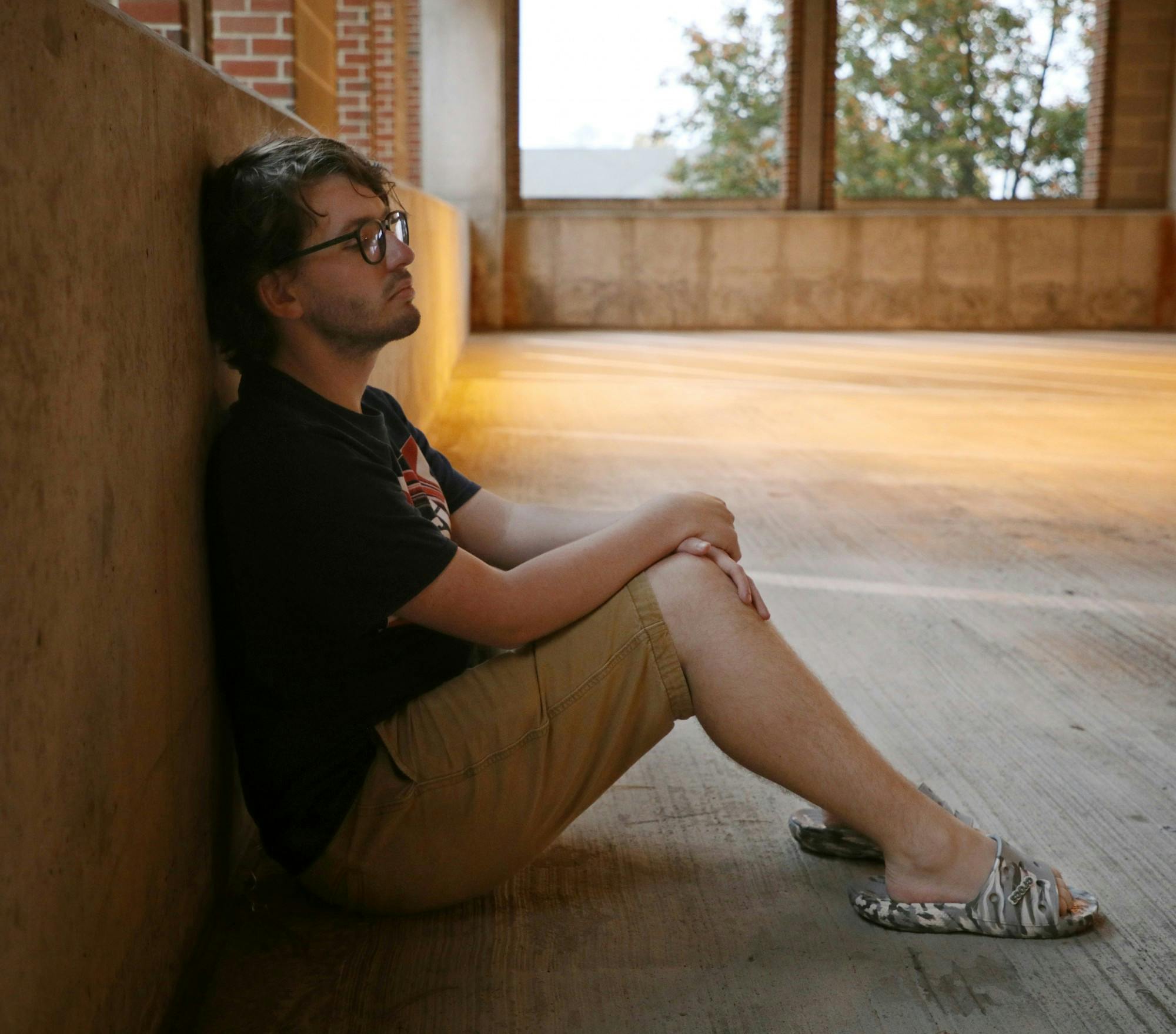 Second-year Grayson Joslin poses for a photo inside McKinley Avenue Parking Garage Oct. 25 in Muncie, Ind. Amber Pietz, DN