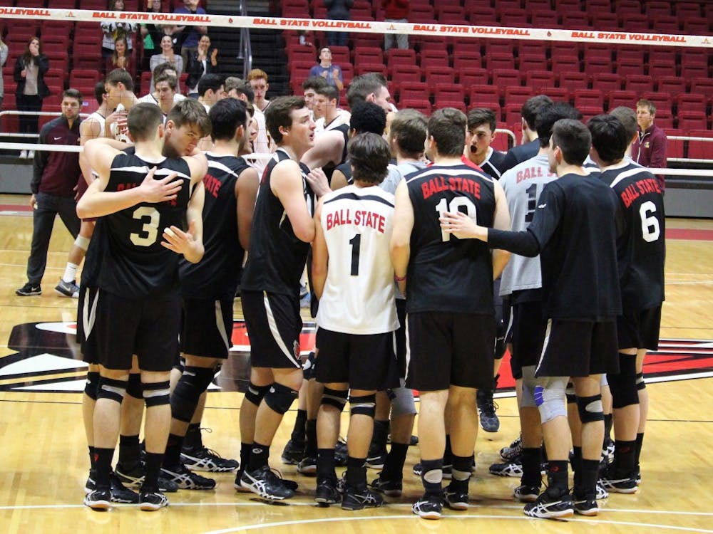 Ball State Men’s Volleyball team celebrates the win over No. 10 Loyola-Chicago in John E. Worthen Arena on April 8. The team secured the 4 seed in the MIVA Tournament by sweeping the Ramblers and winning by 19 points. Alicia M. Barnachea // DN