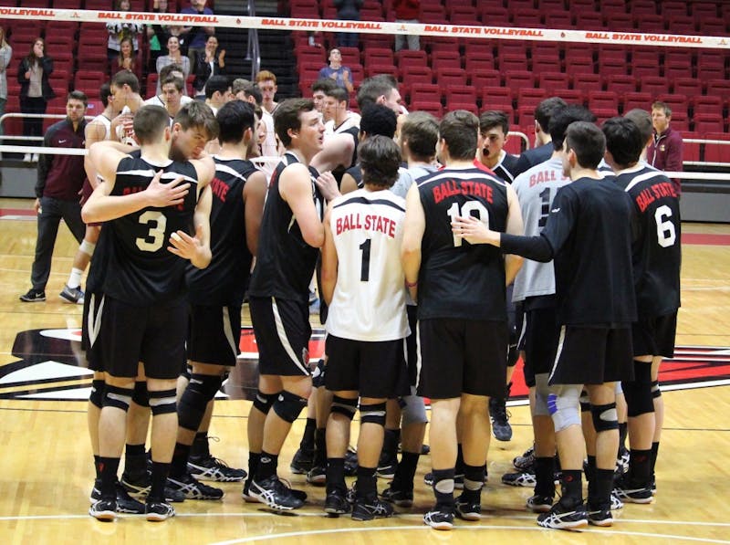 Ball State Men’s Volleyball team celebrates the win over No. 10 Loyola-Chicago in John E. Worthen Arena on April 8. The team secured the 4 seed in the MIVA Tournament by sweeping the Ramblers and winning by 19 points. Alicia M. Barnachea // DN