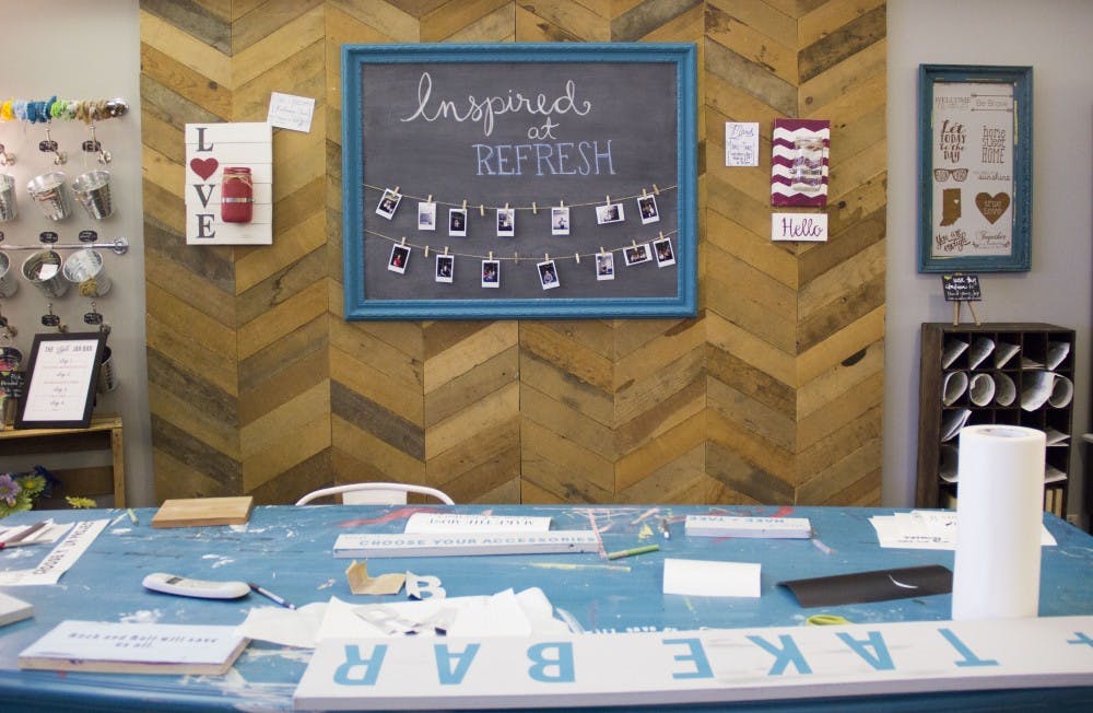 Refresh is a locally owned custom furniture store in downtown Muncie. The store opened three years ago under a different owner. One of the things customers can take part in is making their own Ball jar with various accessories. The store also hosts a “BYOF” class for customers to bring their own furniture to paint. DN PHOTO EMMA ROGERS