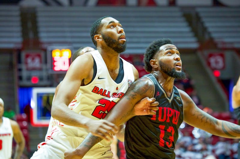 Redshirt Senior Forward, Tahjai Teague (25), looks on in an attempt to grab a rebound over a defender against , IUPUI Dec 7, 2019, in John E. Worthen Arena. The Cardinals beat the Jaguars in a blowout victory 102-54. Omari Smith, DN