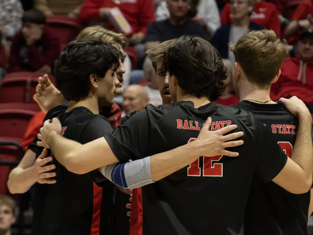 Ball State Men's Volleyball team huddles during the game against Purdue Fort Wayne Feb. 27 at Worthen Arena. Emmely Candelaria, DN