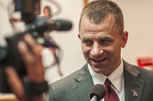 Coach James Whitford fields press questions after the conclusion of the formal press conference April 10, 2013. Whitford started out with a press conference in the Alumni Lounge then visited students during lunch at the Atrium and met with children at the YMCA later in the evening. DN PHOTO JONATHAN MIKSANEK