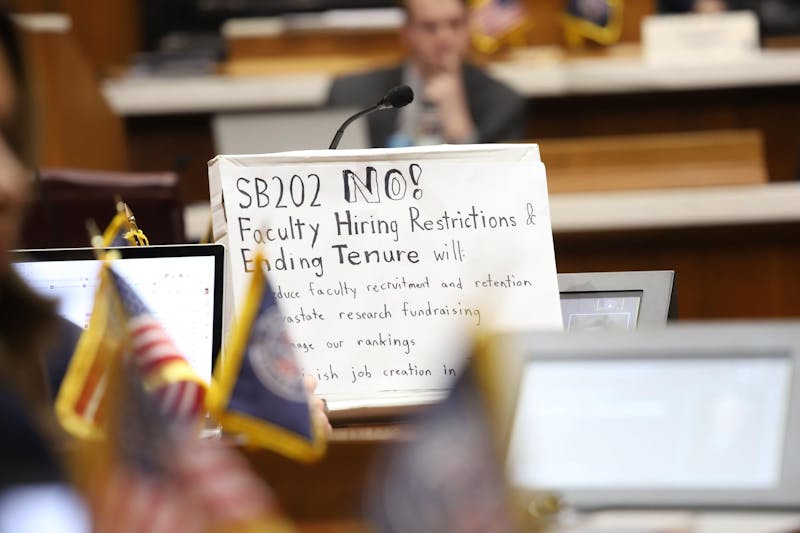 A sign taped to a box sits in the Indiana House Chamber during a House Education Committee Meeting Feb.14 in Indianapolis. Individuals shared testimonies opposing Indiana Senate Bill 202. Olivia Ground, DN