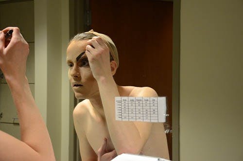 Charlie Kraus puts on make-up to transform into his drag persona, Tequila Mockingbird. Spectrum will host a drag show this Saturday. DN PHOTO BOBBY ELLIS