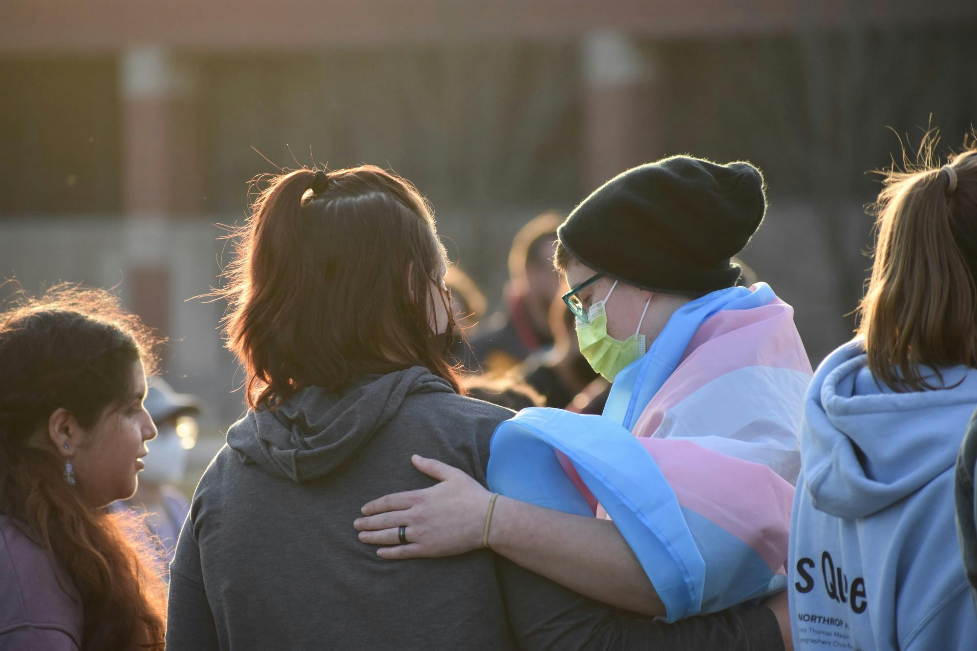 Chloee Bowne (left) and Ezra Dalton (right) hug one another after listening to several speakers at a rally against House Bill 1041 Feb. 1, 2022 at University Green. At the time, Dalton was a sophomore at Ball State and the treasurer of Ball State Spectrum. Grace Duerksen, DN