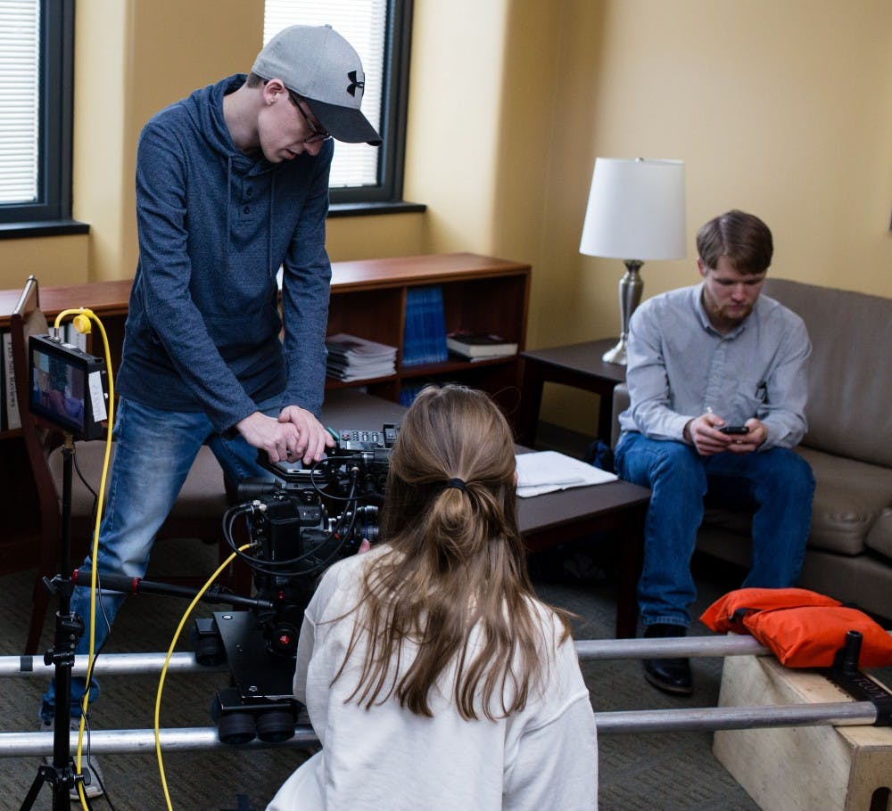 <p>Students work on producing the short film, "Fairy," which will air on WIPB. Pictured is left Hayden Goldsworthy, middle Marissa Anderson and director Elijah Brand. <strong>Allison Griffith, Photo Provided</strong></p>