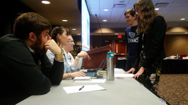 Student Government Association slate Amplify meets for a short break during its senate meeting Wednesday, Feb. 6, in the L.A. Pittenger Student Center. The senate proposed a resolution calling for a letter to be sent to Indiana representatives to form a new hate crime law. Charles Melton, DN