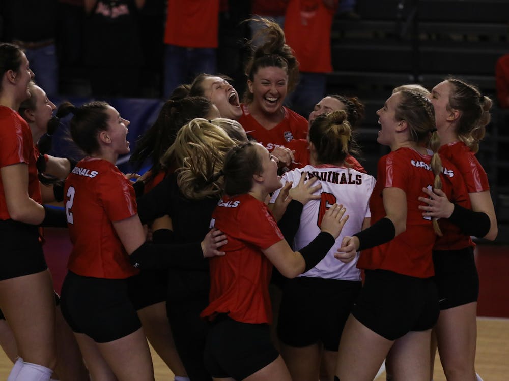Ball State women's volleyball celebrates its first NCAA tournament win in 26 years against the University of Michigan at L & N Federal Credit Union Arena Dec. 3. Ball State will face off against the University of Louisville Dec. 4 in the second round of the tournament. Jacy Bradley, DN