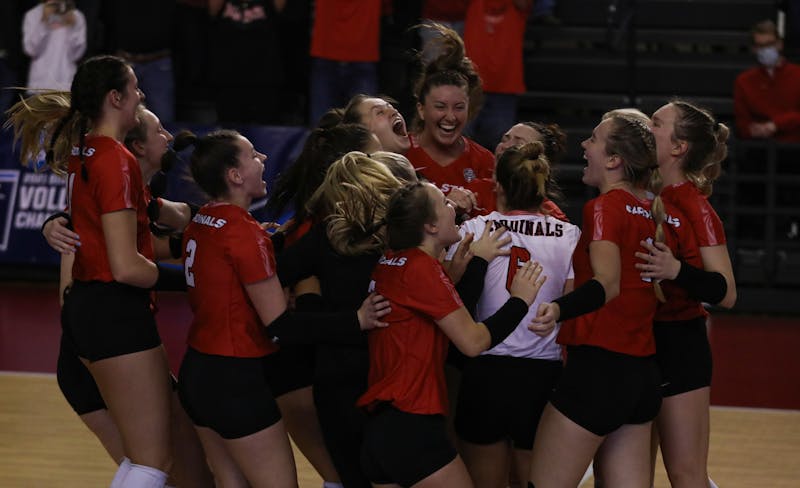 Ball State women's volleyball celebrates its first NCAA tournament win in 26 years against the University of Michigan at L & N Federal Credit Union Arena Dec. 3. Ball State will face off against the University of Louisville Dec. 4 in the second round of the tournament. Jacy Bradley, DN