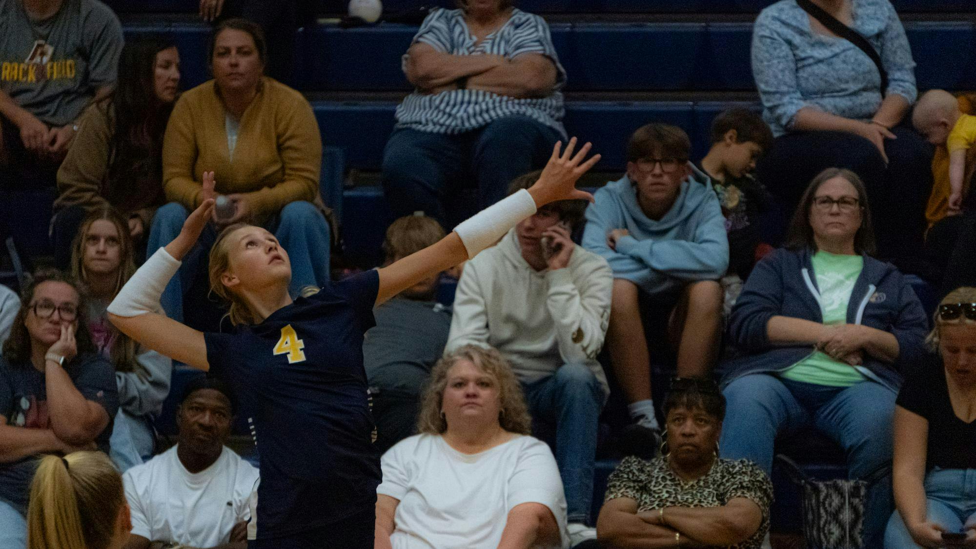 Junior outside hitter, Baylee Rich, jumps for an attack on a ball against Brebeuf on Sept. 3. Brebeuf would take the match in three straight sets.
