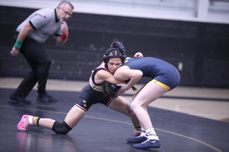 Daleville sophomore Kynlie Keffer wrestles Dec. 18 against Shenandoah at Daleville Junior/Senior High School. This is the first year the IHSAA recognizes girls' wrestling as an official sport. Zach Carter, DN. 