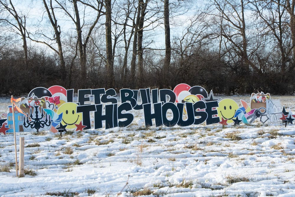 Signs mark the location of the start of construction for a location of Isaiah 117 House. The organization serves to provide a house for foster children to stay in after being removed from their homes and before placement begins. Abigail Denault, DN