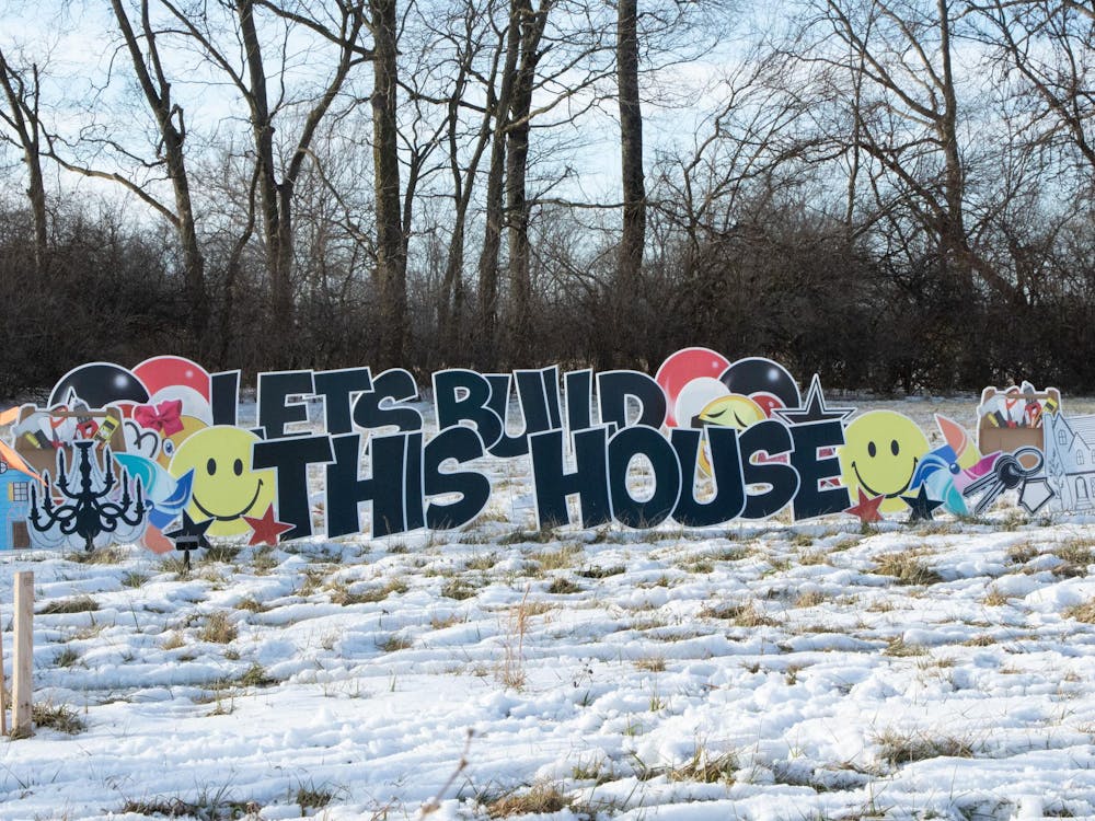 Signs mark the location of the start of construction for a location of Isaiah 117 House. The organization serves to provide a house for foster children to stay in after being removed from their homes and before placement begins. Abigail Denault, DN