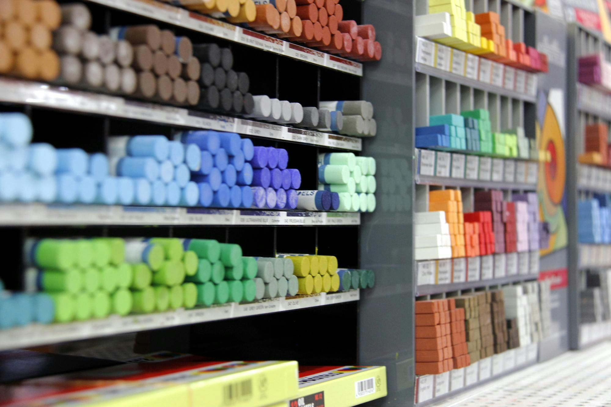 An array of oil pastels arranged by color inside Muncie, Ind.'s Art Mart Sept. 4.