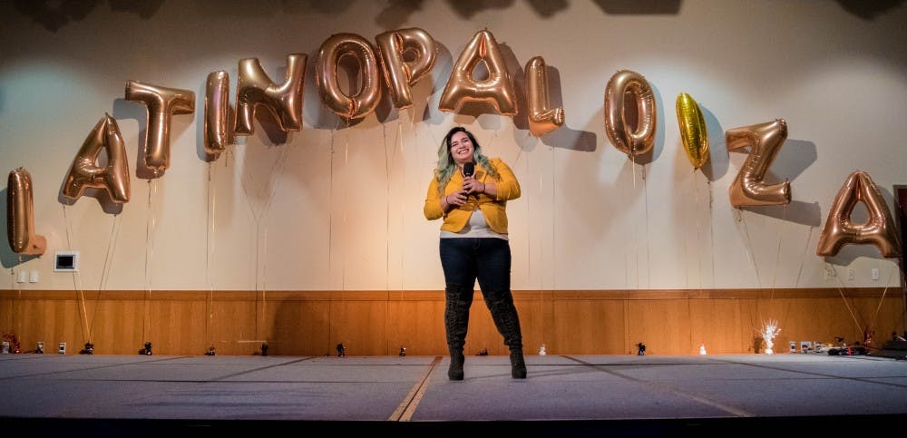 Latinx Student Union hosted the annual talent showcase  'Latinopalooza' in the L.A. Pittenger Student Center on Jan. 20.  Junior Wendy Fant, architect major sings 'amor eterno' by Juan Gabriel.  Stephanie Amador // DN