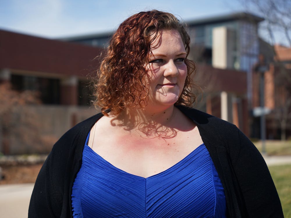 Graduate student social work major Emme Woodward poses for a photo outside of the David Letterman Communication and Media building March 1. Kate Farr, DN