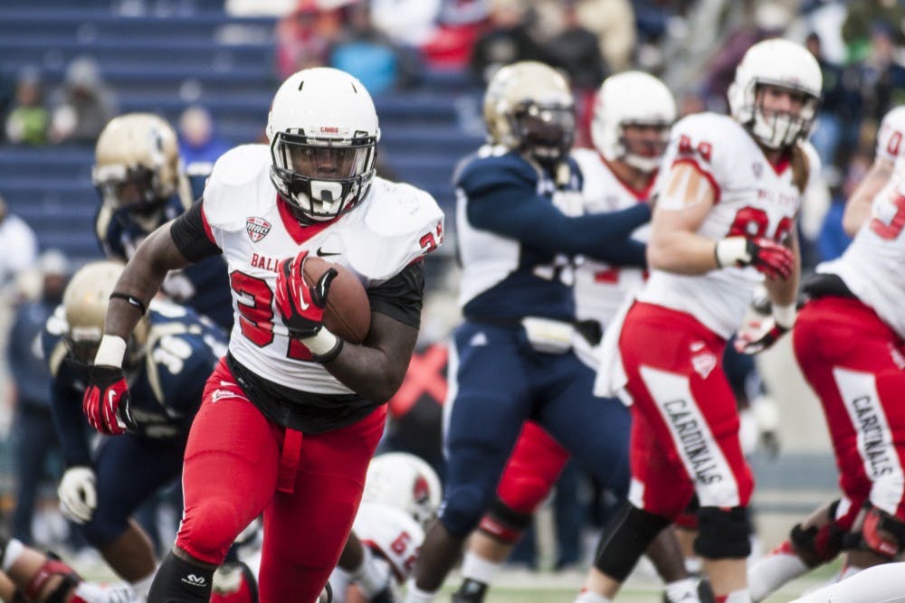 Junior running back Jahwan Edwards breaks away from the Akron defense during their game on Oct. 26 at Summa Field. Ball State was up 28-10 at the half. DN PHOTO JONATHAN MIKSANEK