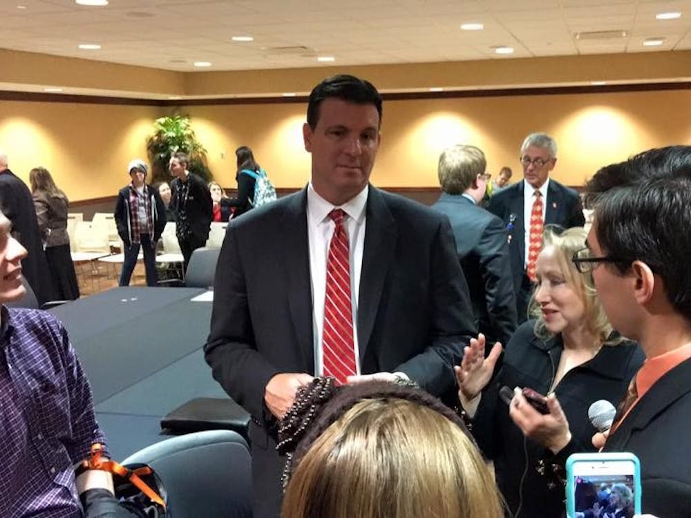 Board members and the acting President take questions from students following the Board of Trustees meeting Friday afternoon. 