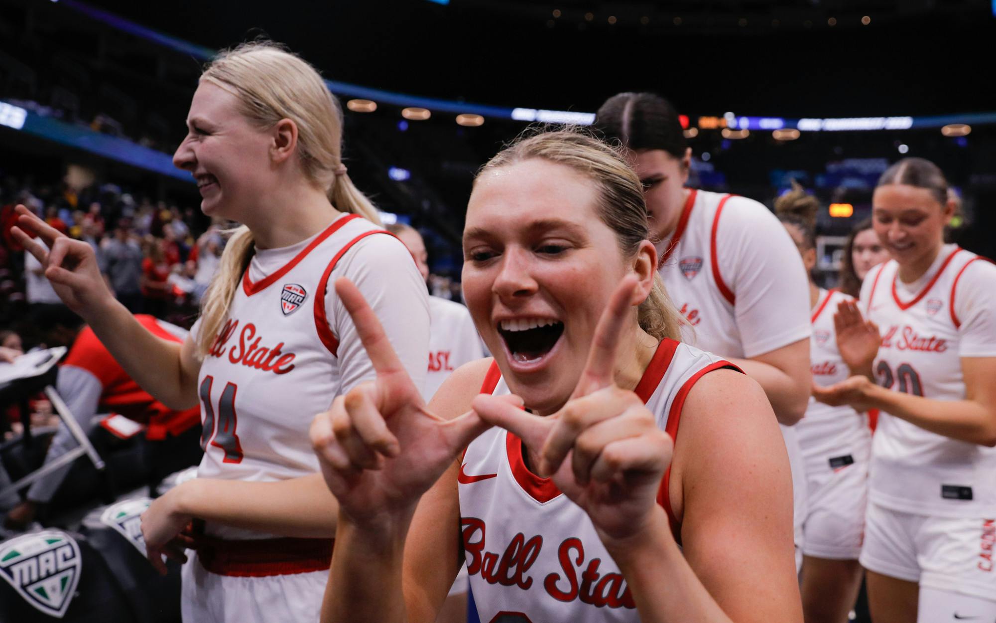 Ball State women basketball team celebrates their win against Kent State March 14 for the MAC semi-final game at Rocket Arena in Cleveland, Oh. Ball State won 70-53 over the Flashes. Andrew Berger, DN  