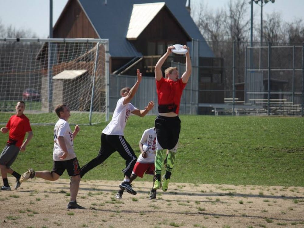 Ball State students play a round of Ultimate Frisbee. Tim Perkey, president of Ball State