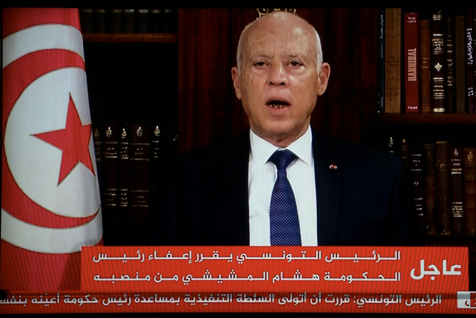 In a photo taken from a television, Tunisian President Kais Saied announces the dissolution of parliament and Prime Minister Hichem Mechichi's government on Sunday, July 25, 2021 at Carthage Palace after a day of nationwide protest. (Fethi Belaid/AFP/Getty Images/TNS)