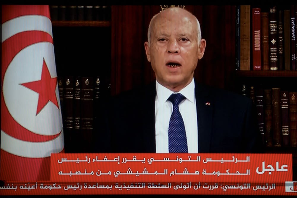 In a photo taken from a television, Tunisian President Kais Saied announces the dissolution of parliament and Prime Minister Hichem Mechichi's government on Sunday, July 25, 2021 at Carthage Palace after a day of nationwide protest. (Fethi Belaid/AFP/Getty Images/TNS)