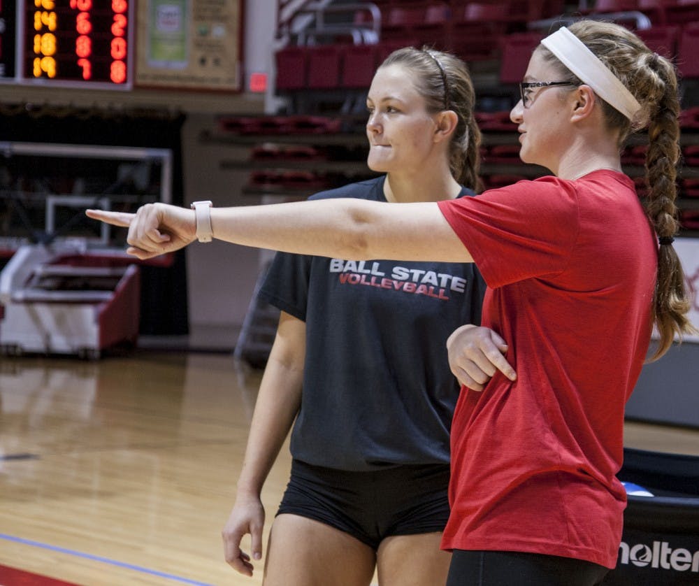 Sabrina Mangapora coaches Senior Jessica Lindsey during practice on Oct. 4 in John E. Worthen Arena. Mangapora is a student assistant coach after being medically disqualified before the 2017 season. Kaiti Sullivan, DN