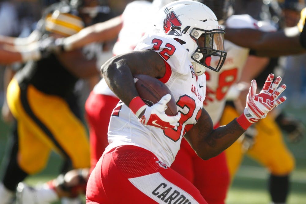  Ball State running back Jahwan Edwards runs the ball downfield on Sept. 6 in Kinnick Stadium. Iowa defeated Ball State, 17-13. (The Daily Iowan/Rachael Westergard)