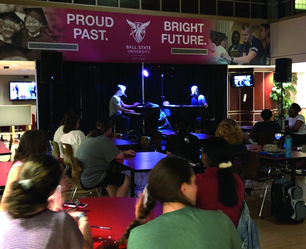 Adam Nelson and Rusty Northrop from Midwest Dueling Pianos perform requested songs Sept. 12, 2019 in the Student Center Tally. Some of the requested songs Nelson and Northrop played include Vanessa Carlton's “A Thousand Miles” and Smash Mouth's "All Star." Grace McCormick, DN. 