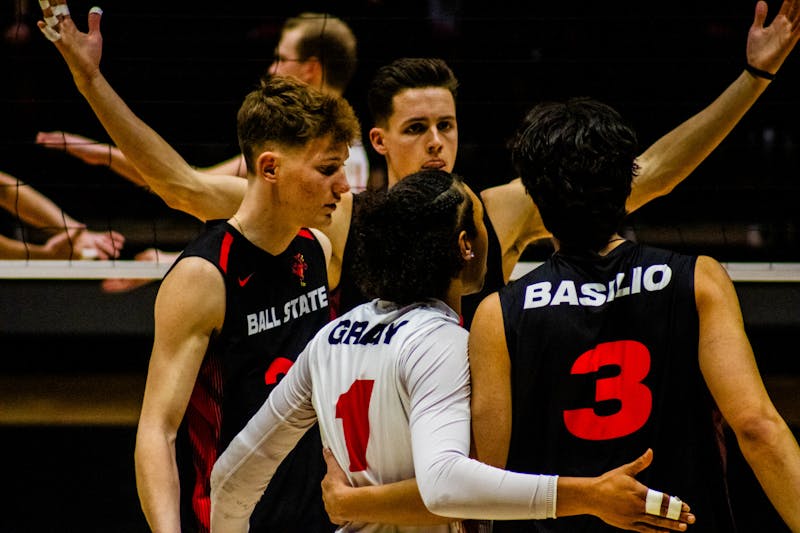 The Cardinals celebrate against Ohio State Feb. 27th at Worthen Arena. The Cardinals won the match 3-2. Jayce Blane, DN