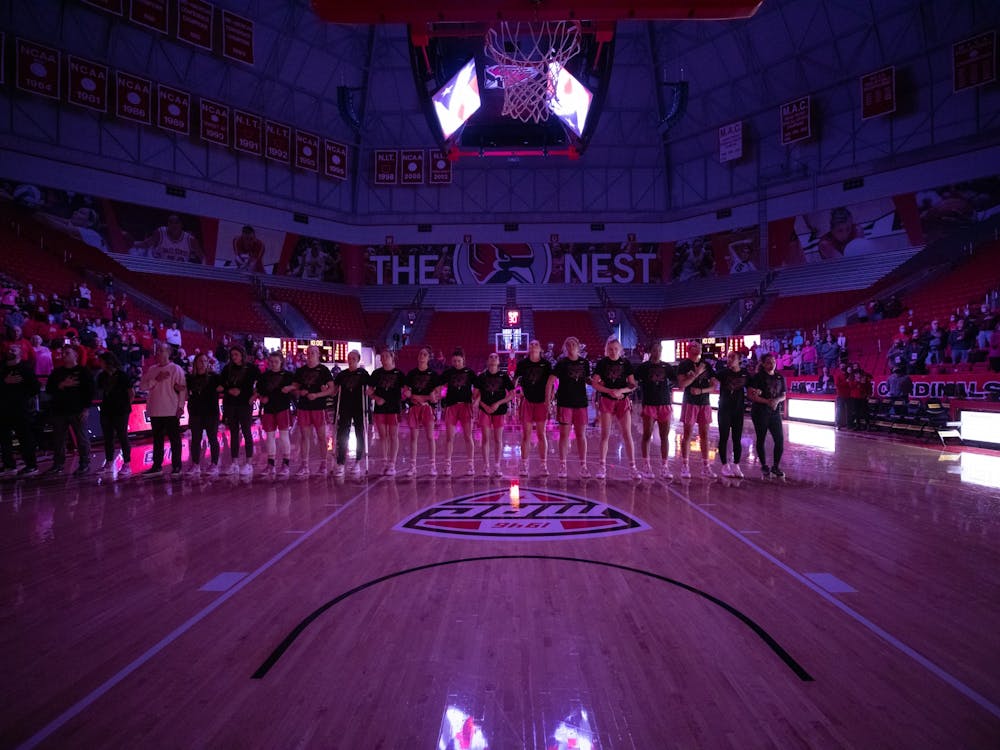 Members of the Ball State Women's Basketball Team stand for the National Anthem before their game against Northern Illinois University Feb. 26 at Worthen Arena. A late push from the Cardinals wasn't enough to best the Huskies in the fourth quarter, losing 77-72. Eli Houser, DN