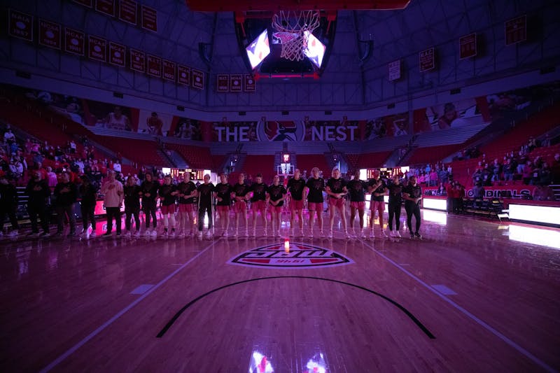 Members of the Ball State Women's Basketball Team stand for the National Anthem before their game against Northern Illinois University Feb. 26 at Worthen Arena. A late push from the Cardinals wasn't enough to best the Huskies in the fourth quarter, losing 77-72. Eli Houser, DN