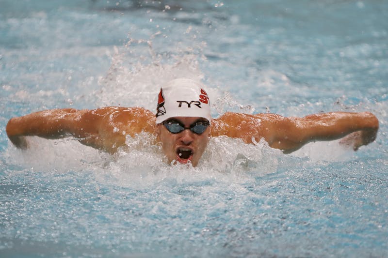 Fourth-year butterfly and freestyle swimmer Bryce Handshoe swims in the men's 100 meter butterfly against Miami Jan. 21 at Lewellen Aquatic Center. Amber Pietz, DN