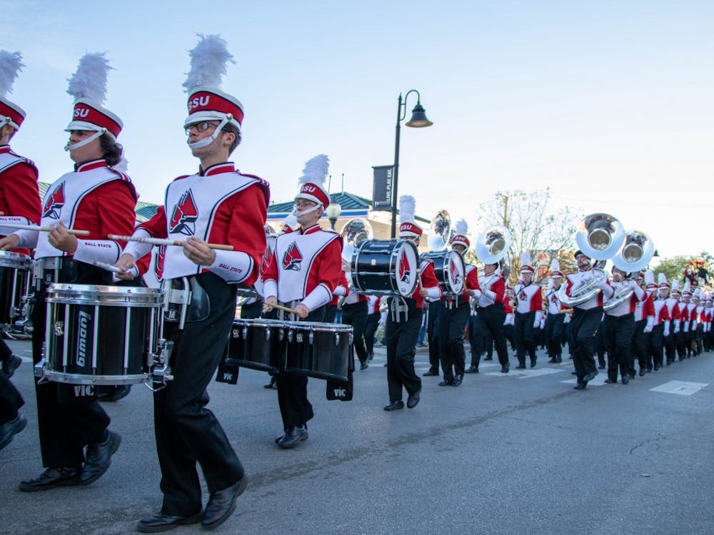 Members of the Pride of Mid-America (POMA) Marching Band perform at the Homecoming Parade on Saturday, Oct. 19, 2019 in the Village. The parade will return for fall 2021 Homecoming. Jaden Whiteman, DN File