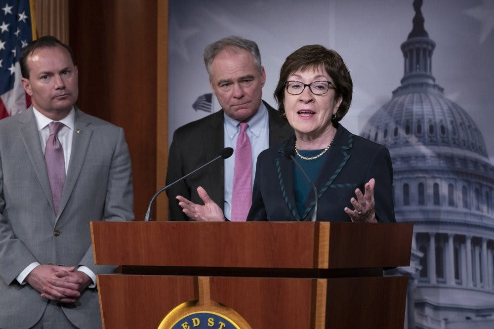 <p>From left, Sen. Mike Lee, R-Utah, Sen. Tim Kaine, D-Va., and Sen. Susan Collins, R-Maine, speak to reporters just after the Senate advanced a bipartisan resolution asserting that President Donald Trump must seek approval from Congress before engaging in further military action against Iran, at the Capitol in Washington, Wednesday, Feb. 12, 2020. <strong>(AP Photo/J. Scott Applewhite)</strong></p>