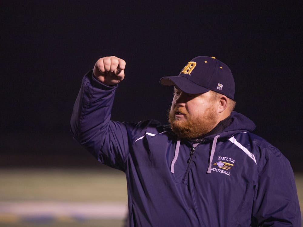 Eagles' head coach Chris Overholt delivers his postgame remarks following Delta's victory over Wayne at Delta High School Oct. 30, 2020. The Eagles defeated the Generals 49-18. Connor Smith, DN.