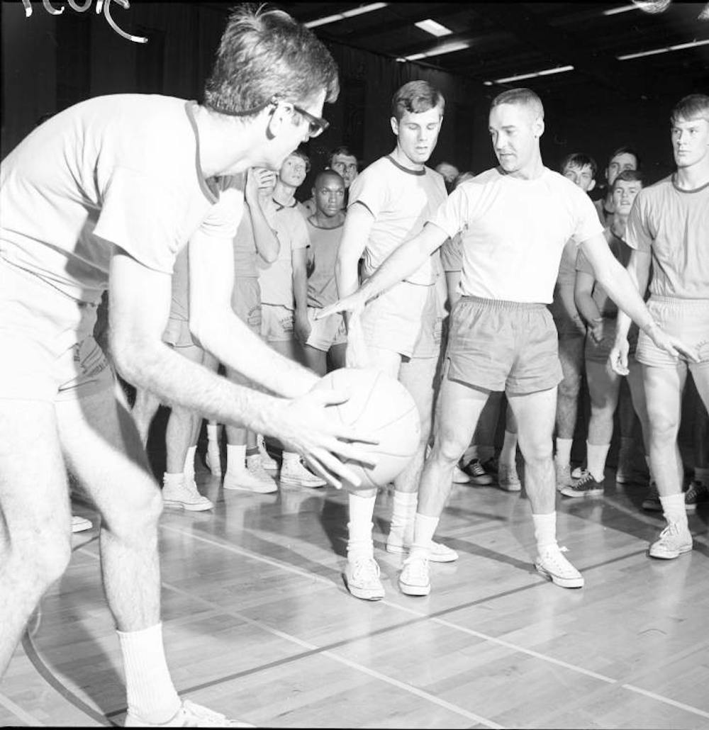 <p>John Reno teaches a Ball State physical education class in 1966 at Irving Gymnasium. Reno was inducted into the Ball State Athletics Hall of Fame in 1991. <strong>Ball State Digital Media Repository, Photo Courtesy</strong></p>