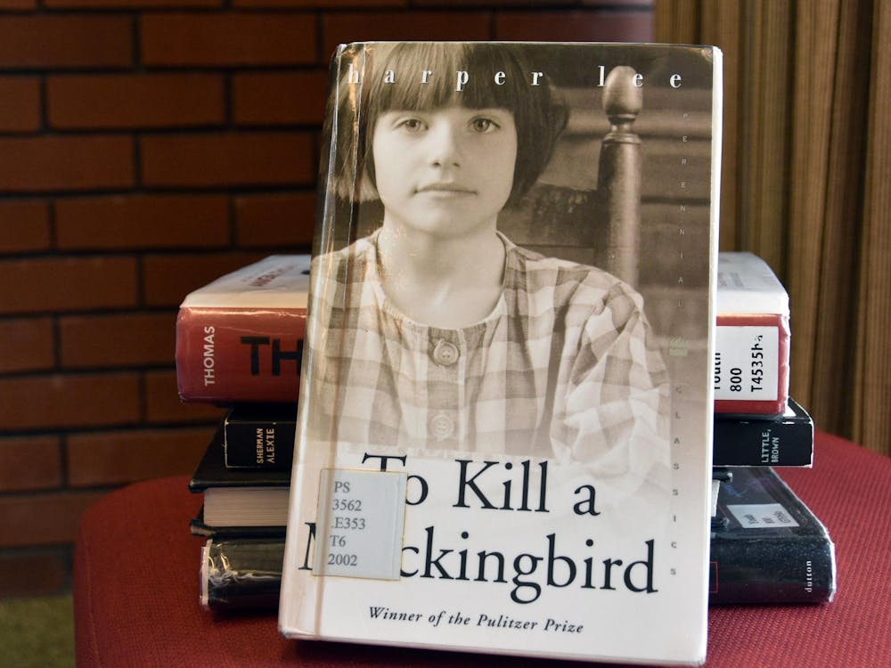 “To Kill a Mockingbird” propped against a stack of books on Sept.29 in Bracken Library. The book is commonly found in public-school curriculum and was on the American Library Association’s top 10 most challenged books for 2020. Ella Howell, DN
