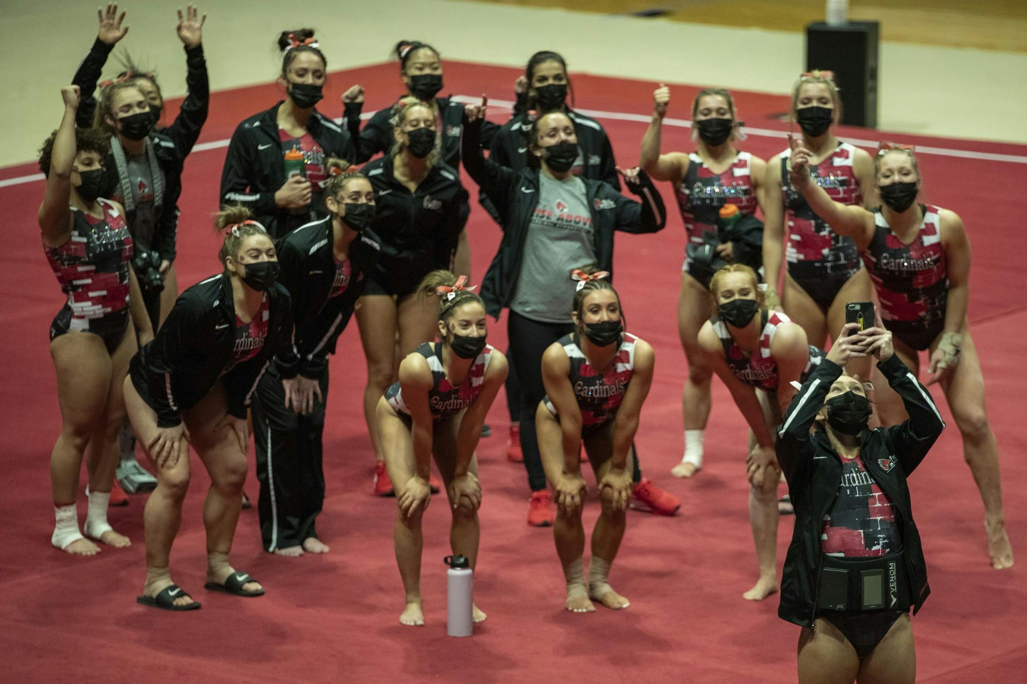 The Ball State Gymnastics team takes a team selfie before facing the Central Michigan Chippewas in their home-opener Jan. 24, 2021, at John E. Worthen Arena. The Cardinals beat the Chippewas 193.500-192.375. Jacob Musselman, DN