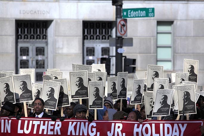 Hundreds of people walk through downtown for the annual Martin Luther King Memorial March in Raleigh, North Carolina, Monday, January 16, 2012. (Takaaki Iwabu/Raleigh News &amp; Observer/MCT)
